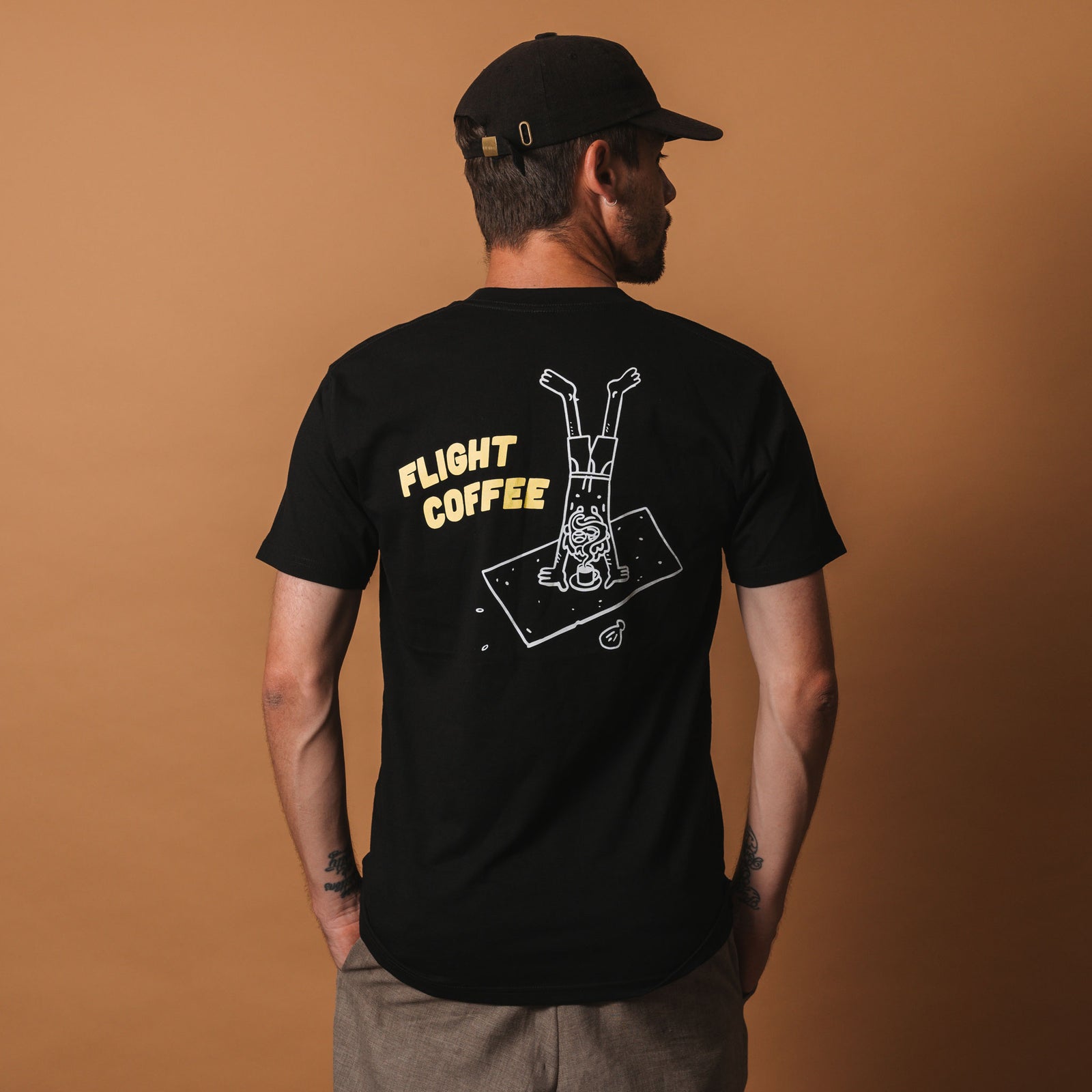 Black beach person tee