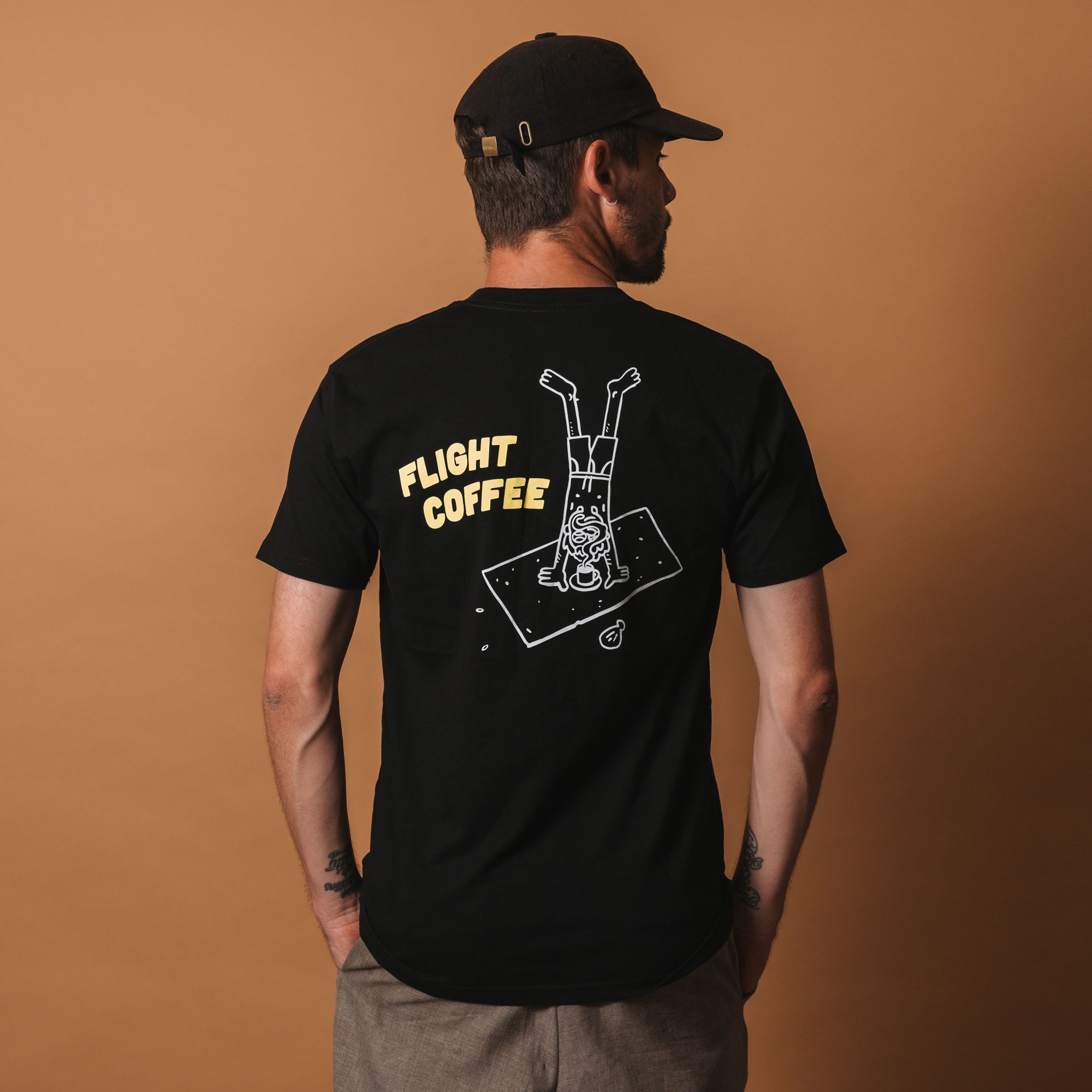 Black beach person tee