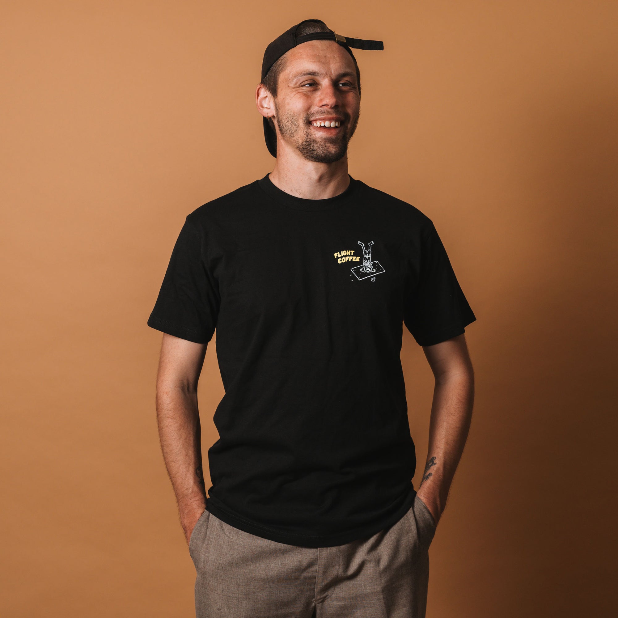 Black beach person tee